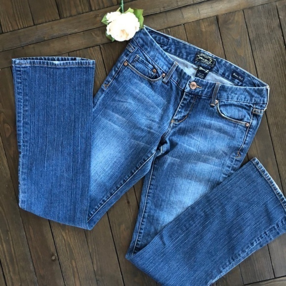 7 for all mankind medium wash boot cut jeans